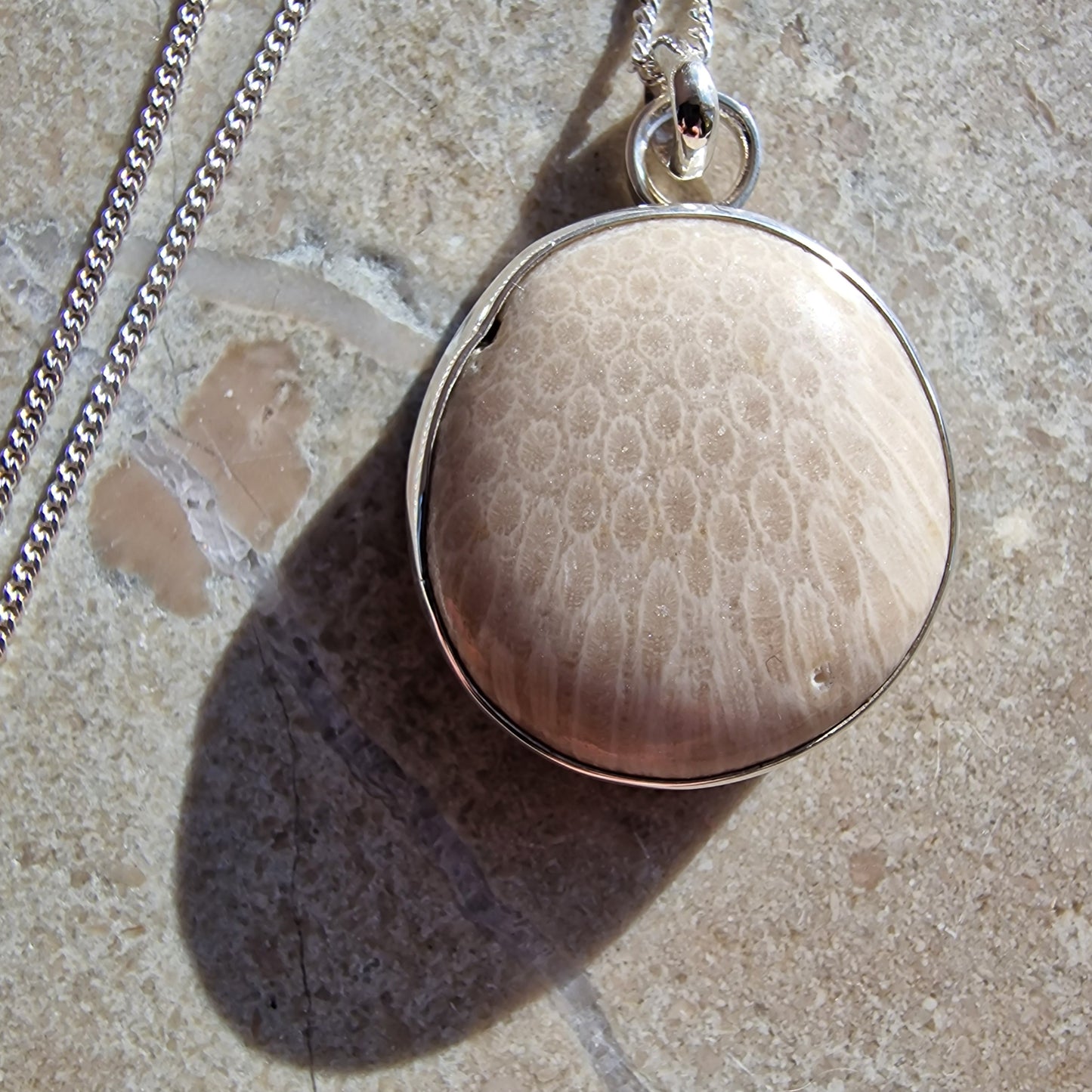 Josefin beach stone necklace with cut white coral stone